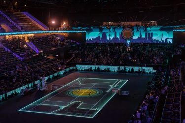 Spectacle avec projection sur le terrain à la mi-temps