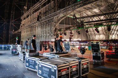 Technicians building the stages